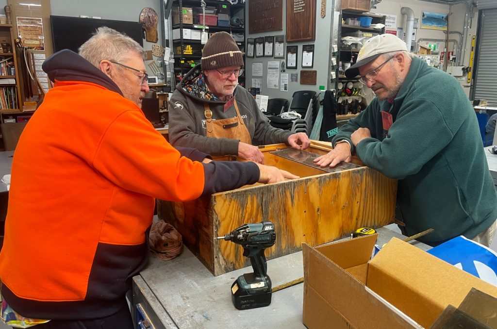 Members of the Men's Shed working on community projects